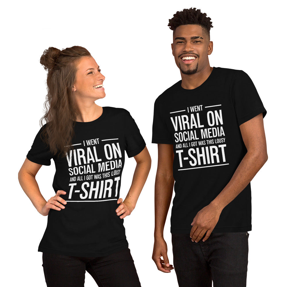 Two people wearing a shirt that reads, "I went viral on social media and all I got was this lousy t-shirt." The t-shirt is black.