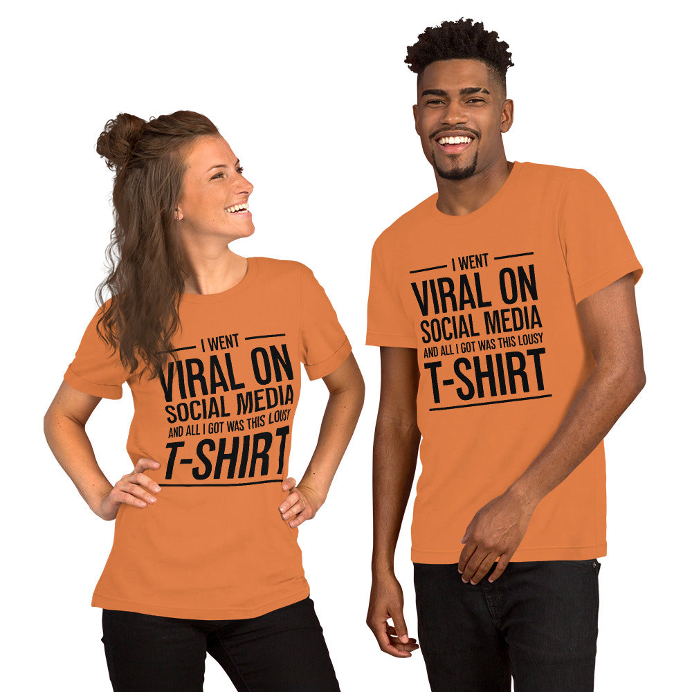 Two people wearing a shirt that reads, "I went viral on social media and all I got was this lousy t-shirt." The t-shirt is burnt orange.
