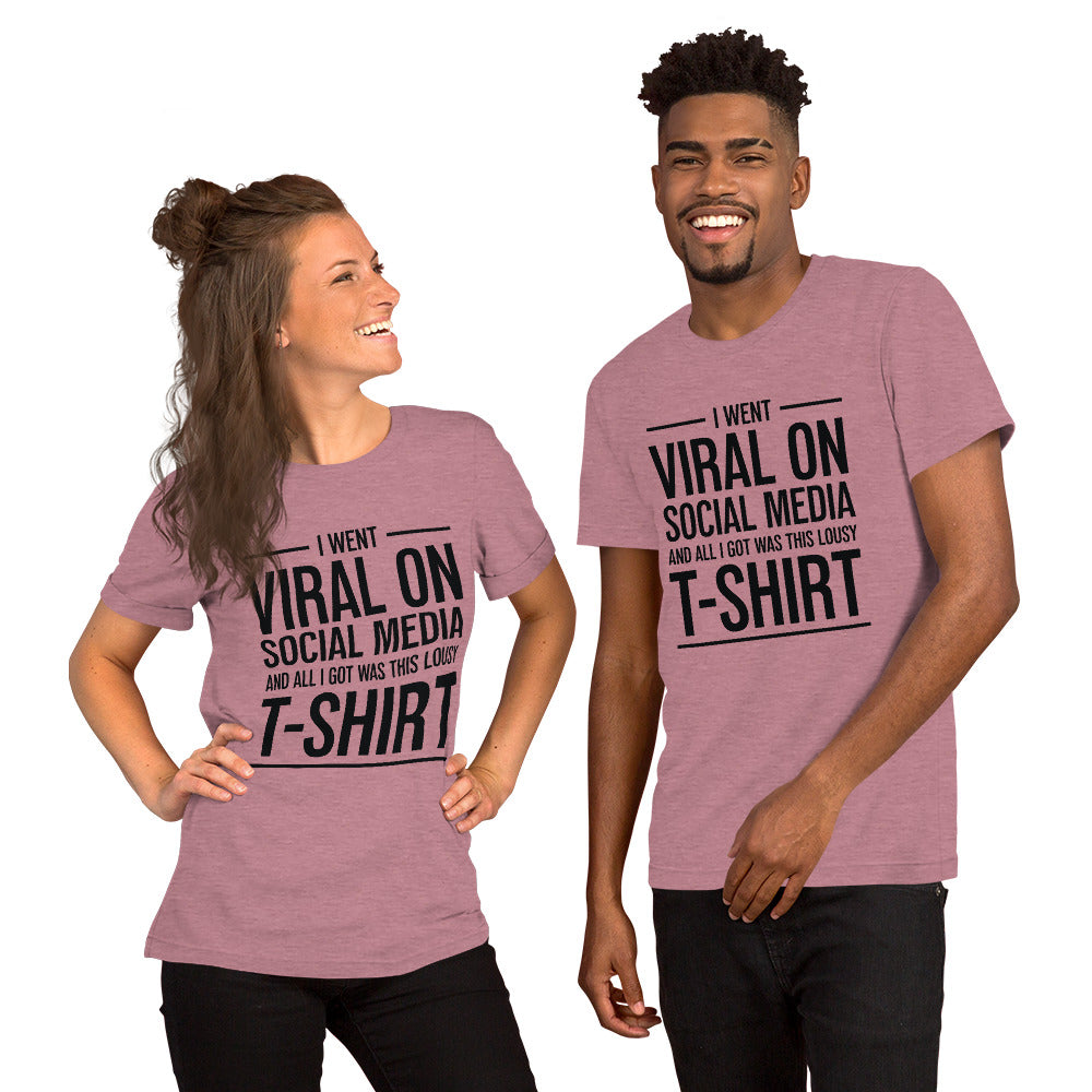 Two people wearing a shirt that reads, "I went viral on social media and all I got was this lousy t-shirt." The t-shirt is heather orchid.