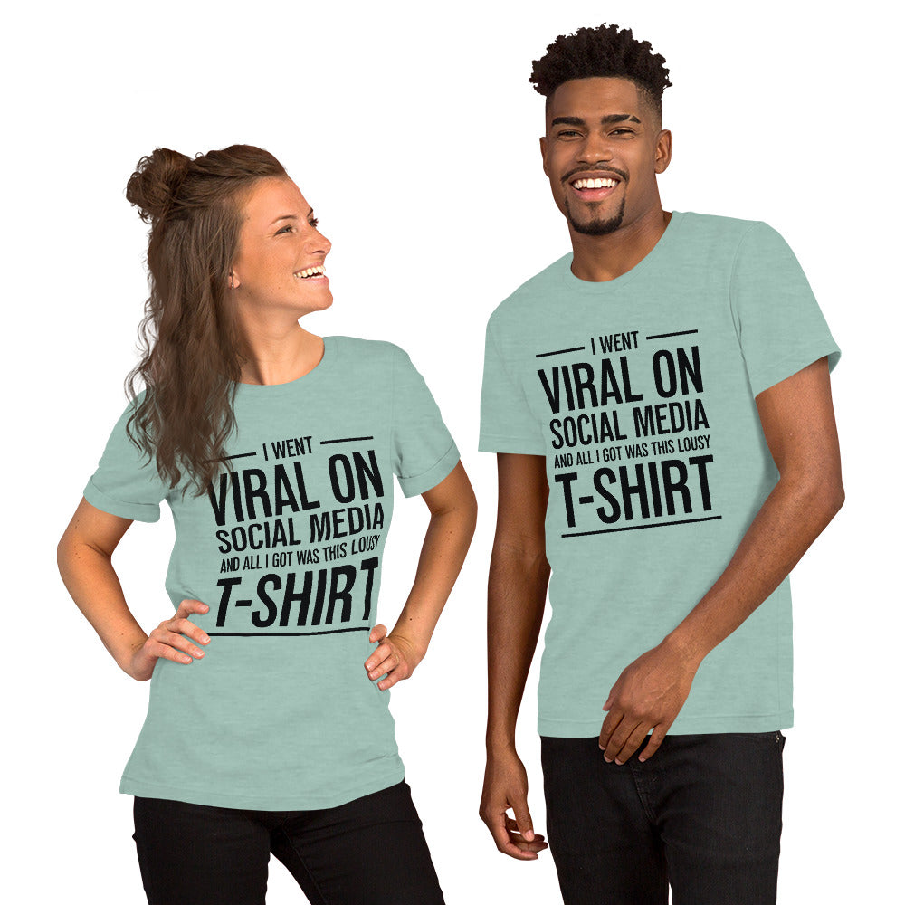 Two people wearing a shirt that reads, "I went viral on social media and all I got was this lousy t-shirt." The t-shirt is heather dusty blue.