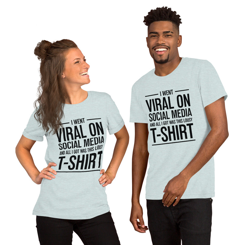 Two people wearing a shirt that reads, "I went viral on social media and all I got was this lousy t-shirt." The t-shirt is heather ice blue.