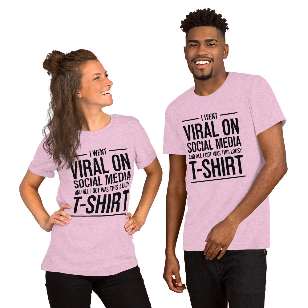Two people wearing a shirt that reads, "I went viral on social media and all I got was this lousy t-shirt." The t-shirt is heather lilac.