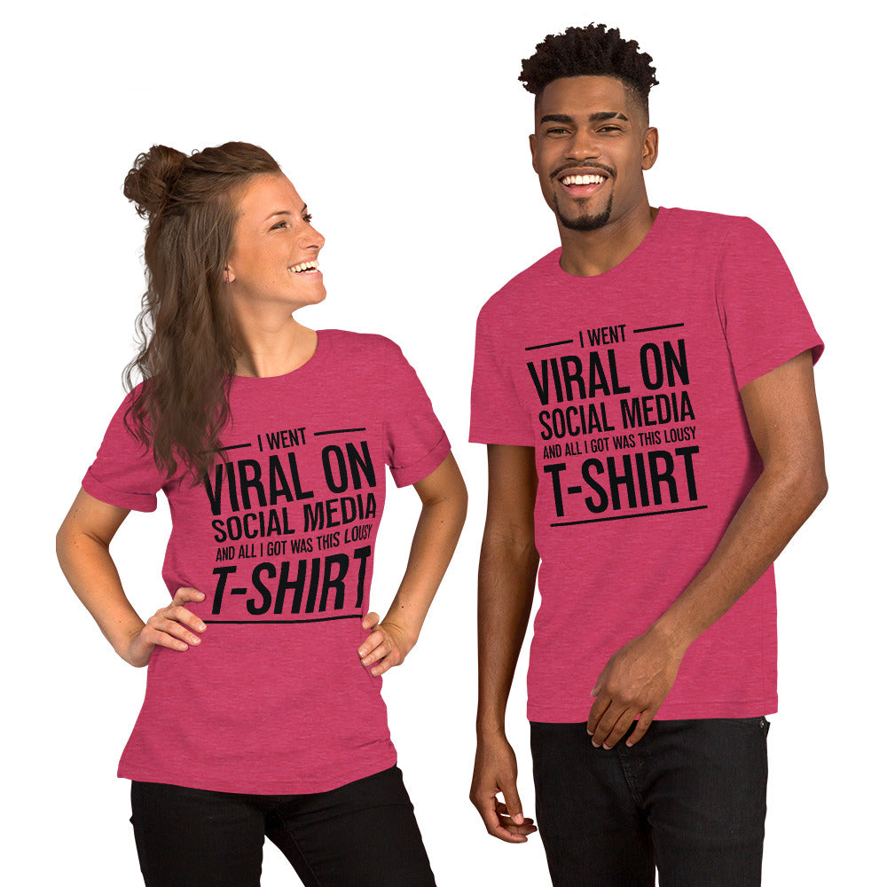 Two people wearing a shirt that reads, "I went viral on social media and all I got was this lousy t-shirt." The t-shirt is heather raspberry.