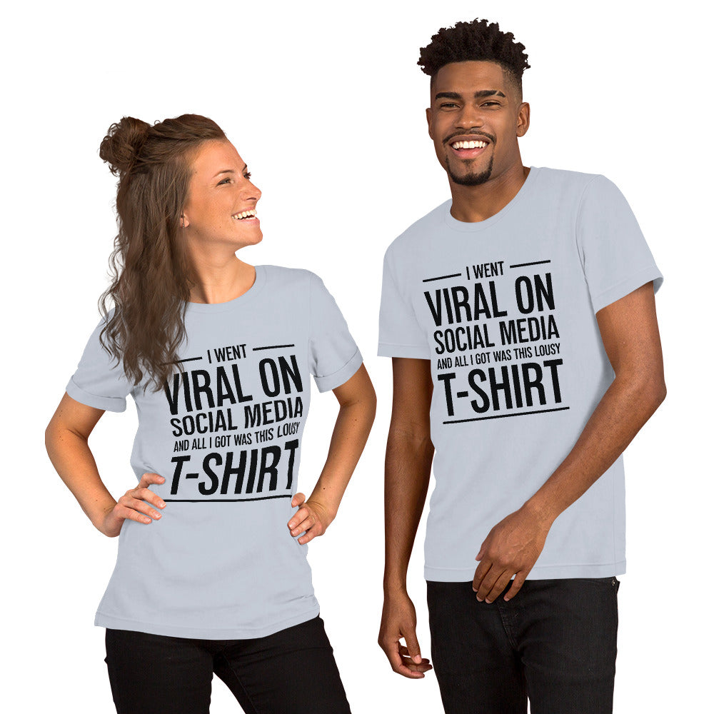 Two people wearing a shirt that reads, "I went viral on social media and all I got was this lousy t-shirt." The t-shirt is light blue.
