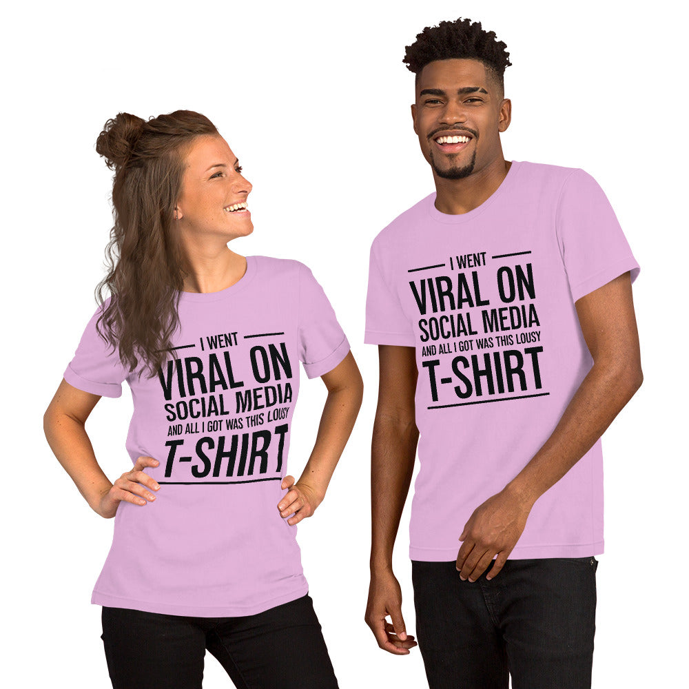 Two people wearing a shirt that reads, "I went viral on social media and all I got was this lousy t-shirt." The t-shirt is light purple.
