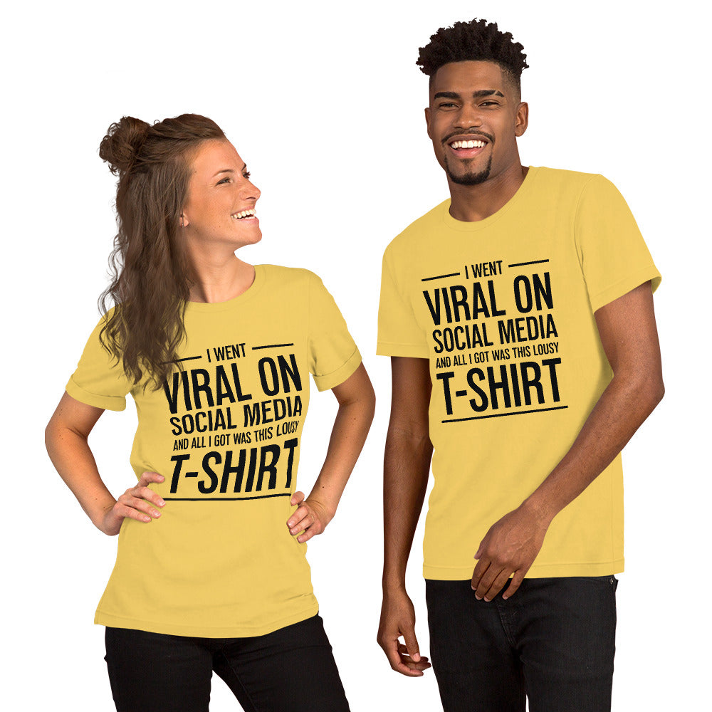 Two people wearing a shirt that reads, "I went viral on social media and all I got was this lousy t-shirt." The t-shirt is yellow.